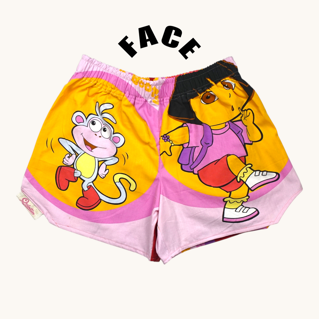 Shorts paracaídas Dora 2 – Algodón reciclado – Talla única (S a L) – Unisex – Colección Cultura Pop – Quintín