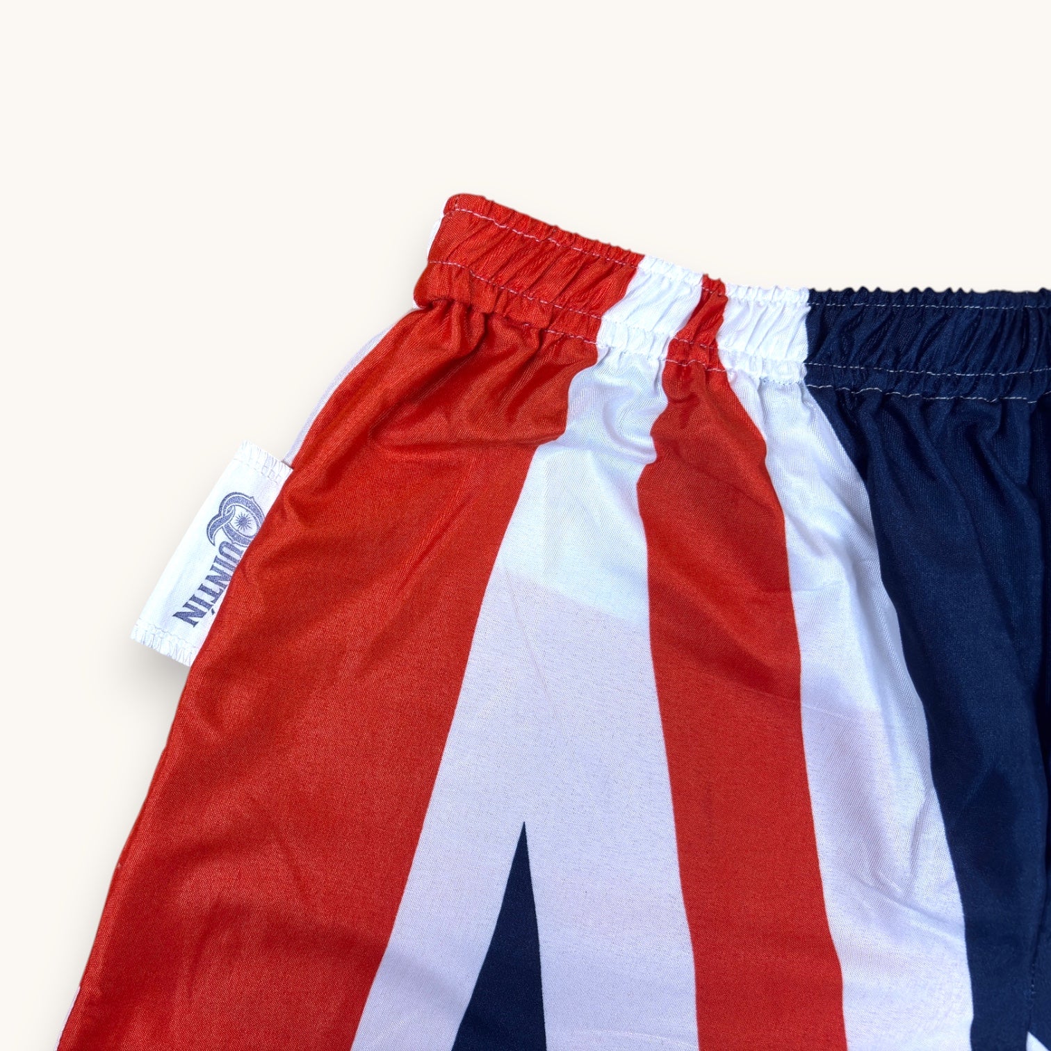 Short parachute Union Jack – Polyester upcyclé – Taille unique S à L – Unisexe – Collection Pop Culture / Rayé – Quintín