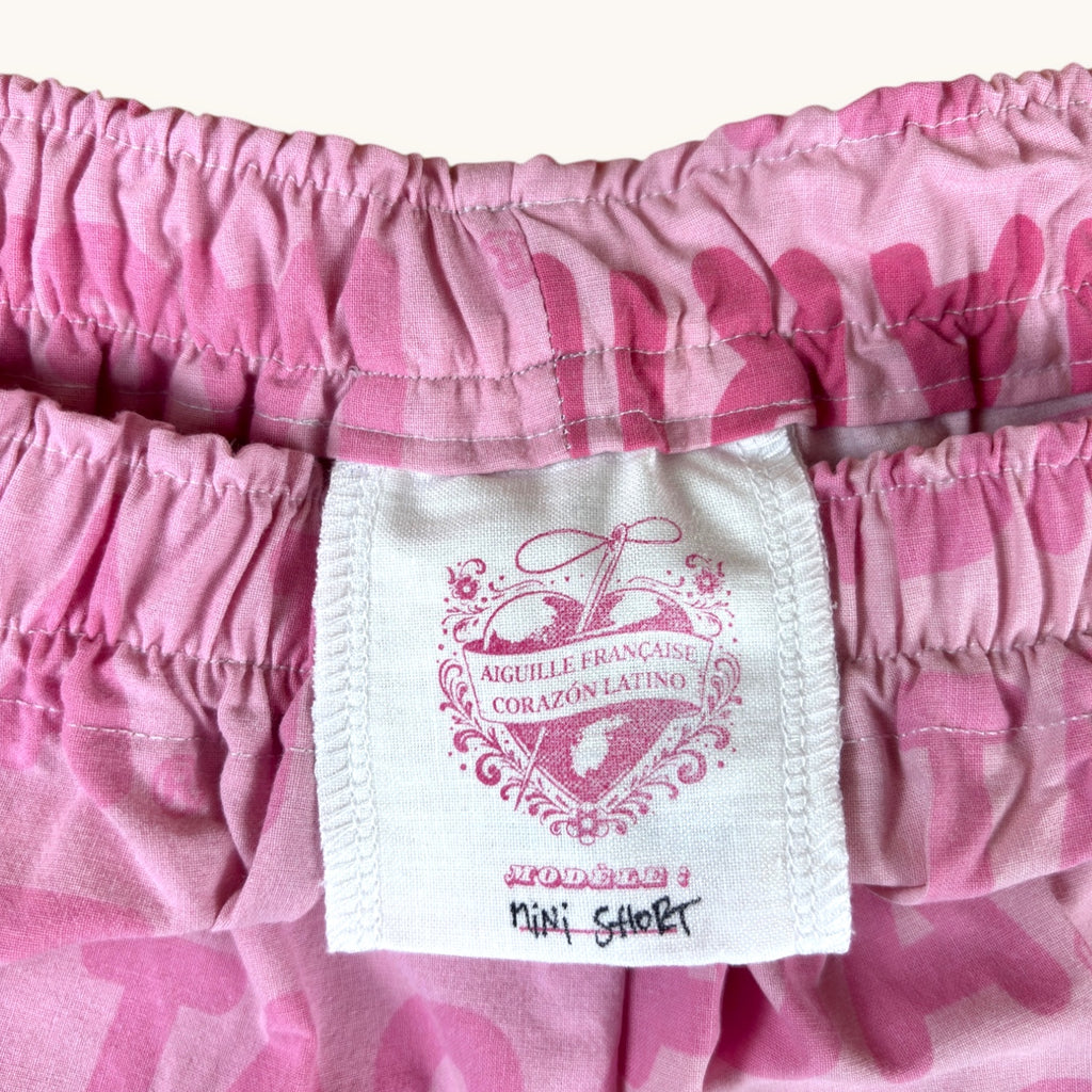 Mini-short Haribo Rose – Coton upcyclé – Taille unique S à L – Unisexe – Collection Pop Culture / Rose Bonbon – Quintín