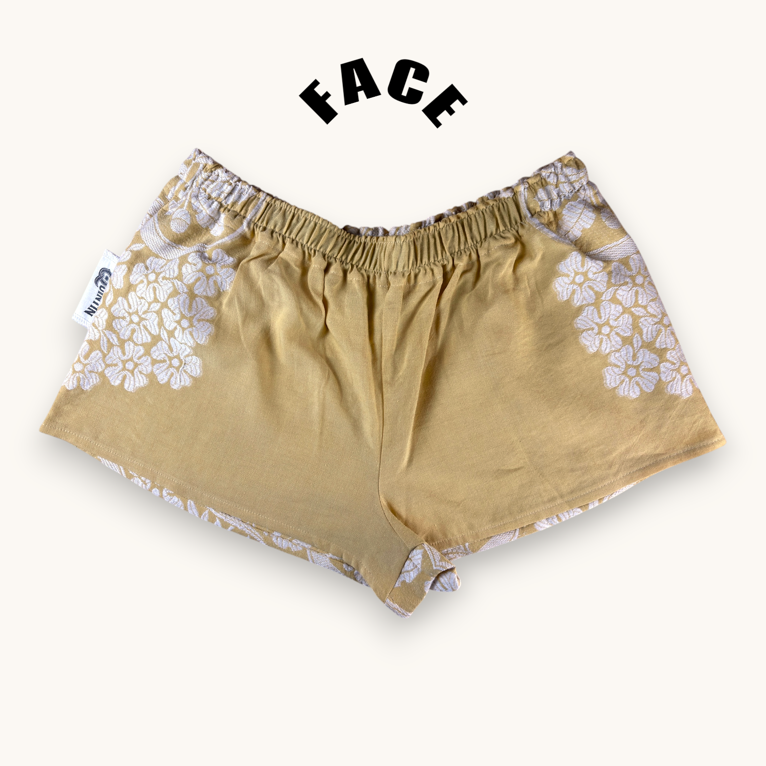 Mini-short Fleurs brodées Moutarde – Coton upcyclé – Taille unique S à L – Unisexe – Collection Fleurs – Quintín